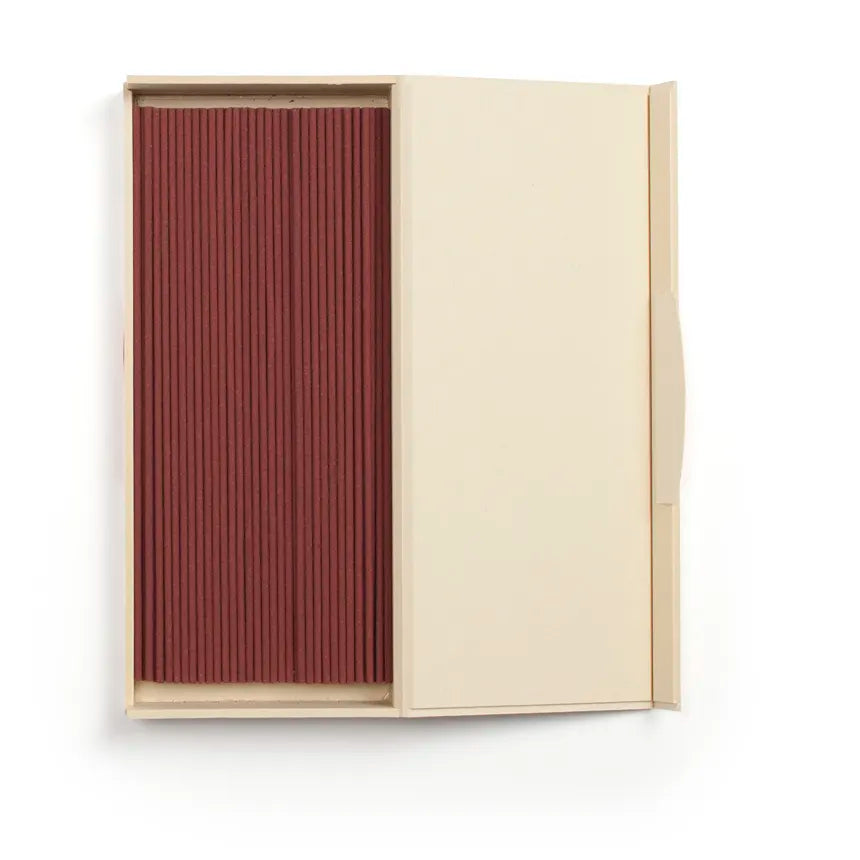 Beige box with a red incense sticks on a white background from Shoyeido