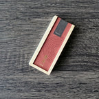 Rectangular wooden incense box product with red Kousaido hitotoki label on a dark wooden surface