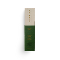 Green and beige incense product packaging with text on a white background