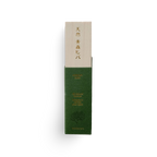Green and beige incense product packaging with text on a white background