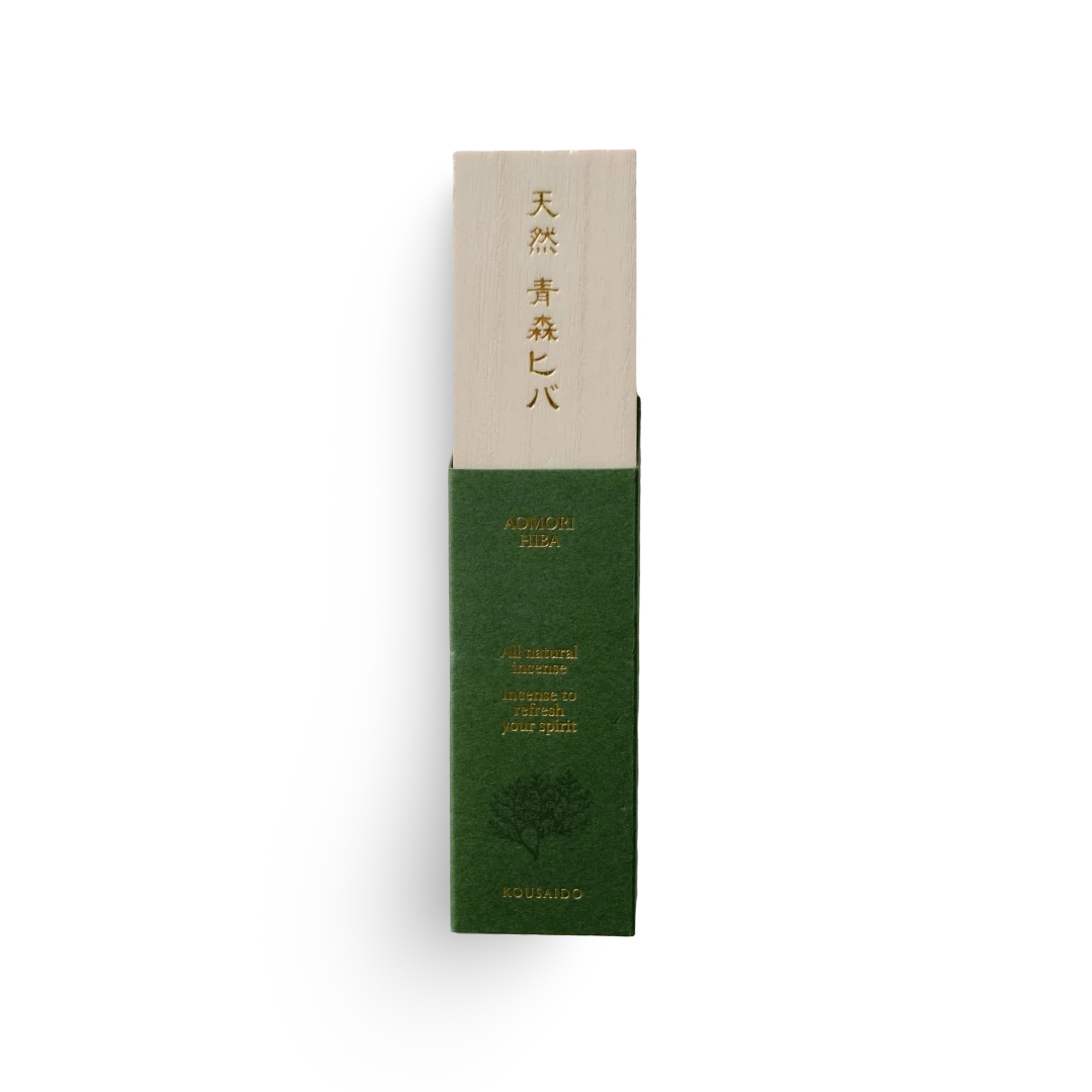 Green and beige incense product packaging with text on a white background