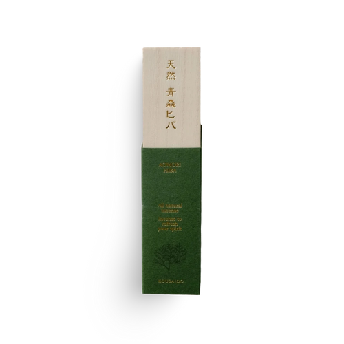 Green and beige incense product packaging with text on a white background