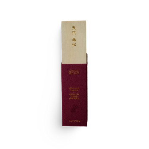 Maroon and beige incense packaging with text on a white background