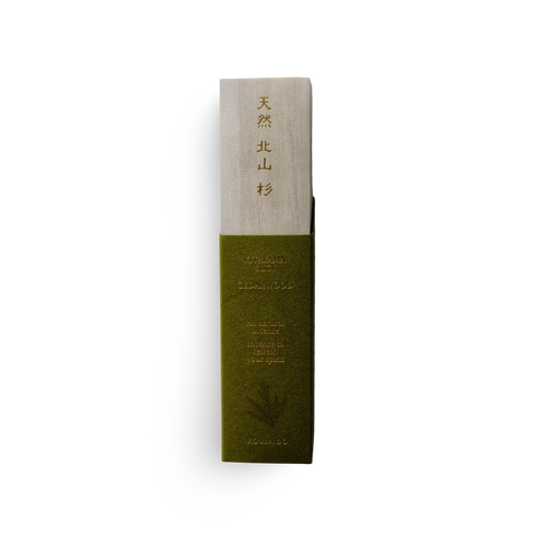 Green and beige incense product packaging with text on a white background