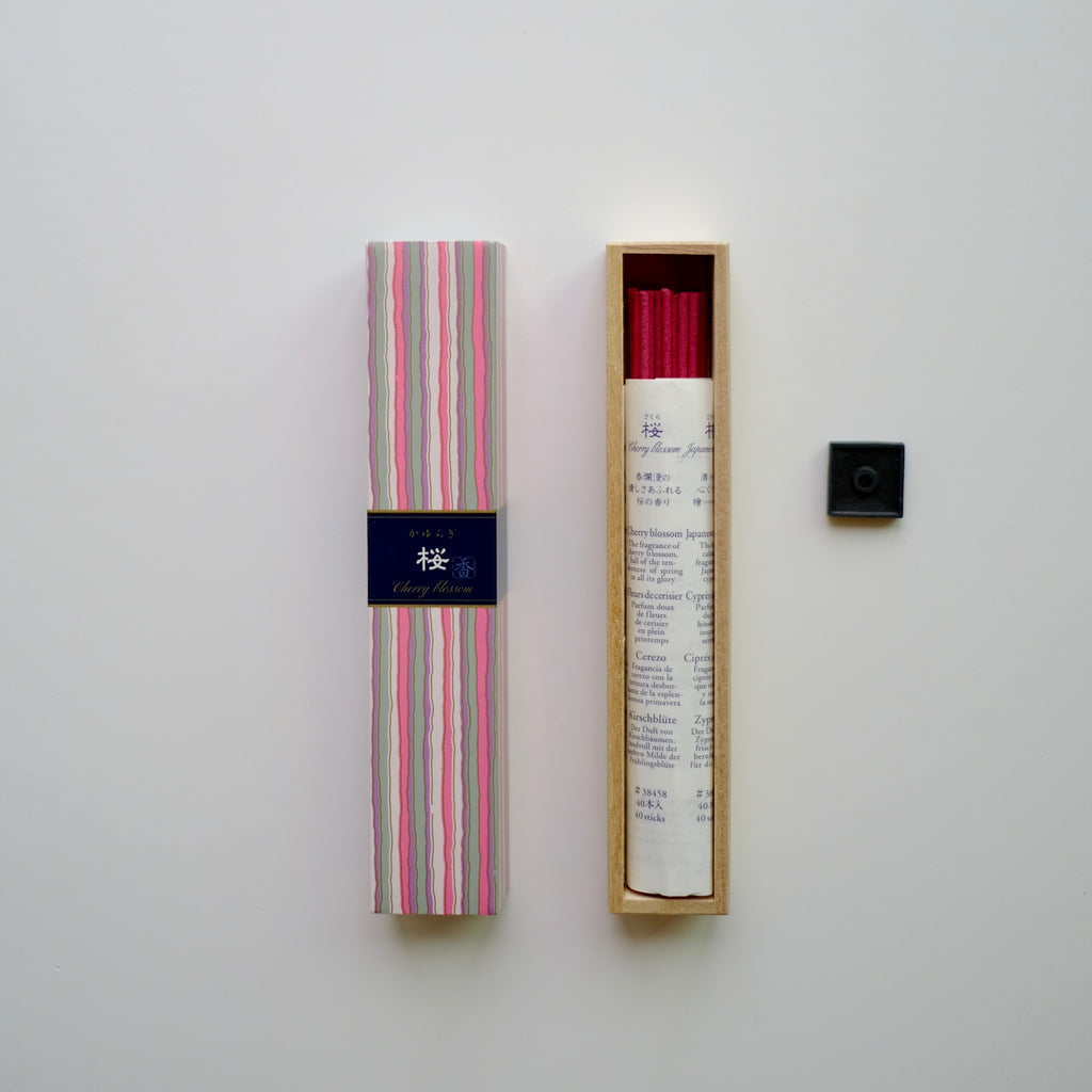 A box of Nippon_Kodo-KAYURAGI_-_Cherry_Blossom_40_sticks with incense box showing on the side. front top view, white background, square crop.