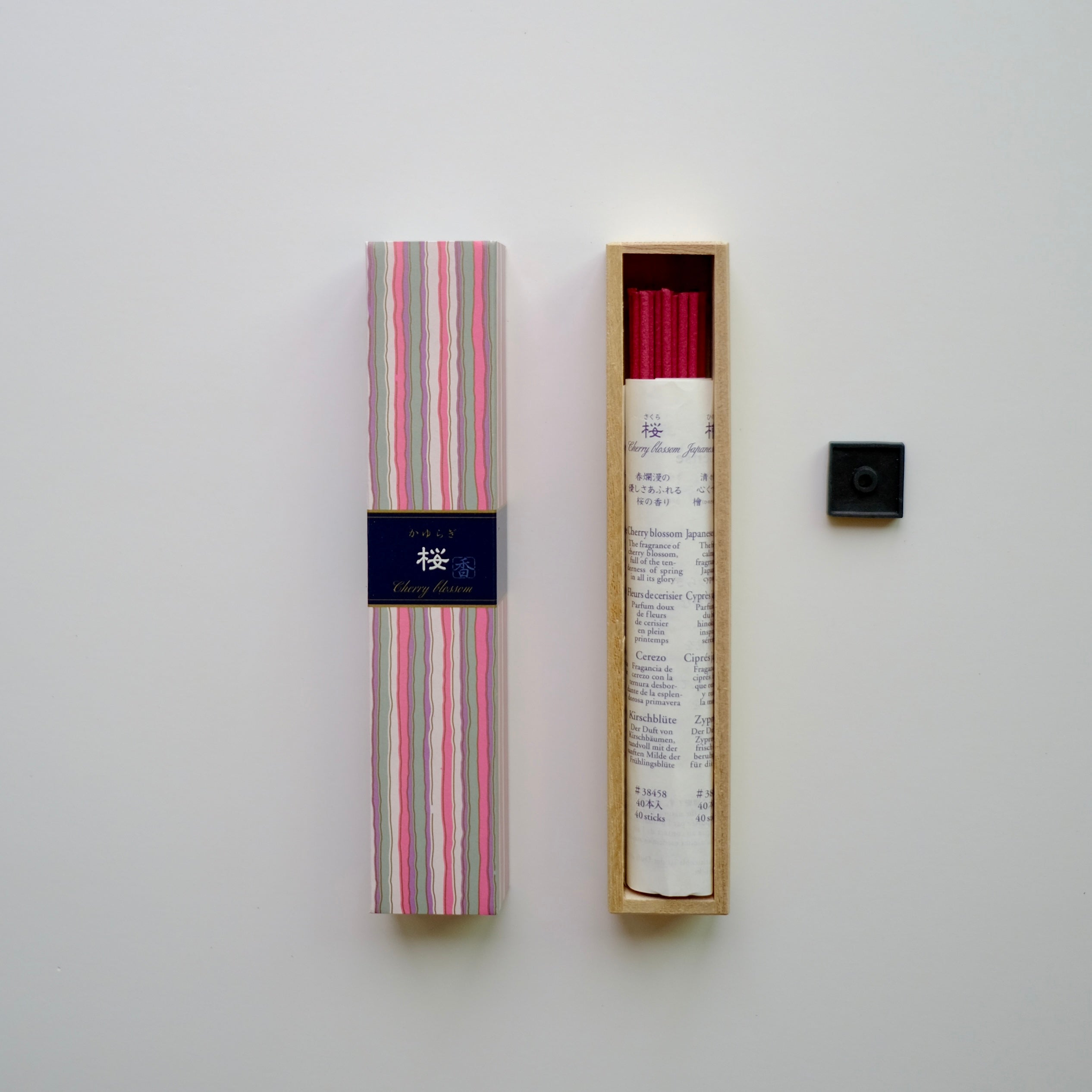 A box of Nippon_Kodo-KAYURAGI_-_Cherry_Blossom_40_sticks with incense box showing on the side. front top view, white background, square crop.