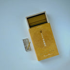Yellow incense box with matches on a light blue background