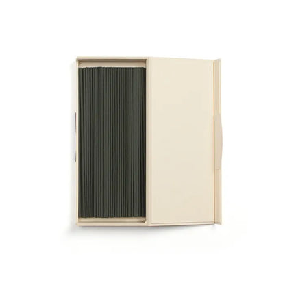 Beige box opened displaying black incense sticks on a white background
